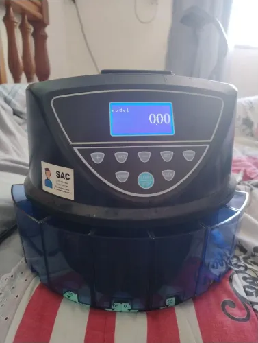 Máquina de contar moedas