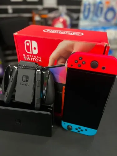 NINTENDO SWITCH OLED DESTRAVADO 256 + 15 JOGOS