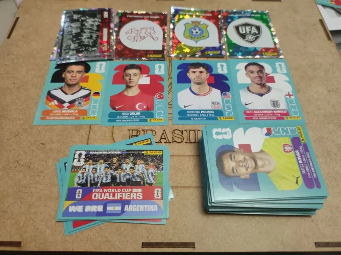 Lote sem repetição 117 figurinhas copa 2026 originais Panini FWC brilhantes escudos