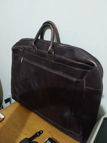 Vendo bolsa de couro grande pra fins transportar projetos de arquitetura e outros.
