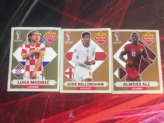 figurinhas legend copa 2022 (modric, bellingham, almoez ali)