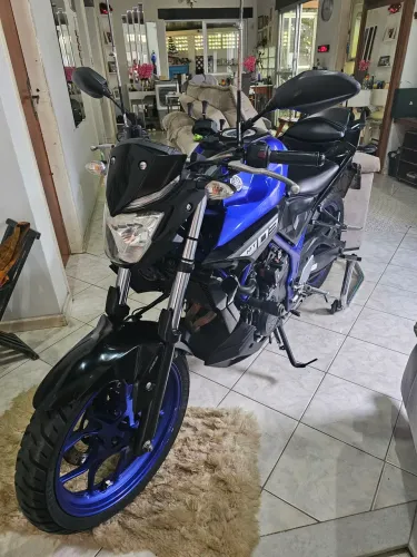 Moto impecável