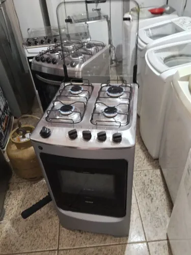 Fogão com quatro bocas com acendedor automático de inox tudo funcionando OK em ótimo