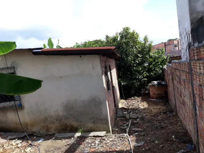 Terreno com casa 