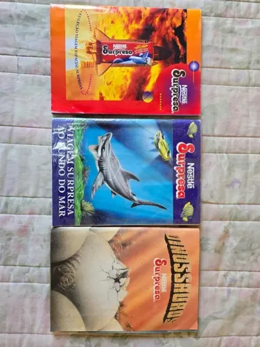 Albuns Antigos Nestle Surpresa (dinossauro, espaço, fundo do mar) - leia o anuncio