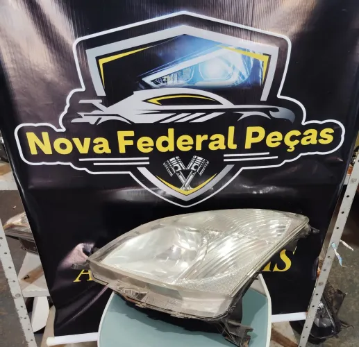 Farol da livina Lando esquerdo