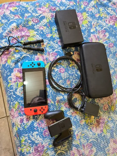 Nintendo Switch Destravado via software + sd 64gb lotado de jogos 