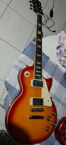 Troco guitarra em drone 