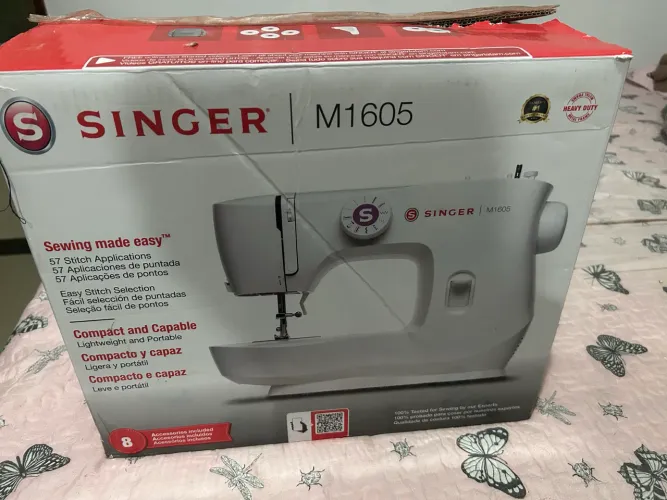 Máquina de costura singer