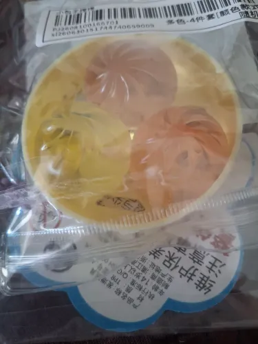 kit com três mini bolinhos de apertar squishys na certinha