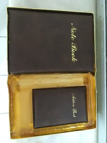 lindo conjunto de caderneta de telefone e caderno de anotações