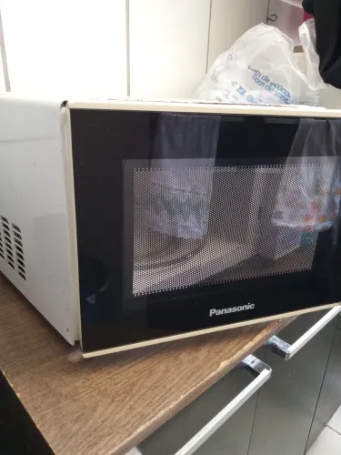 Micro-ondas Panasonic - queimado enferrujado -ideal para reuso de peças ou sucata