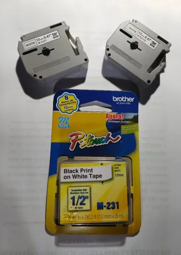 CARTUCHO DE FITA PARA ROTULADOR BROTHER (1 CARTUCHO NOVO e 2 USADOS).