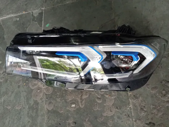 Farol bmw  320 2036 laser  azul