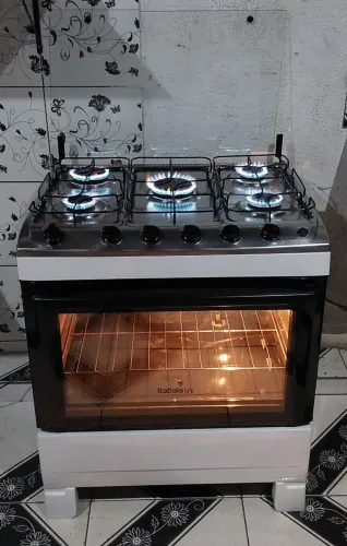 Excelente fogão Itatiaia top com super chama automático com luminária conservado