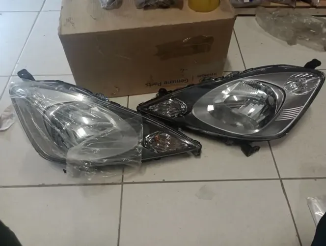 Par de farol Fit 2009/2010/2011 original