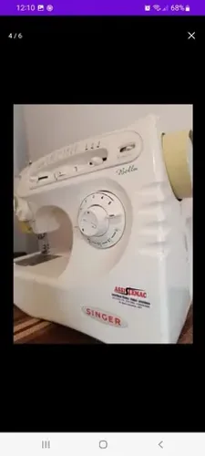 MAQUINA SINGER POUCO USADA!!