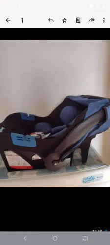 Carrinho com bebê conforto da Burigotto 