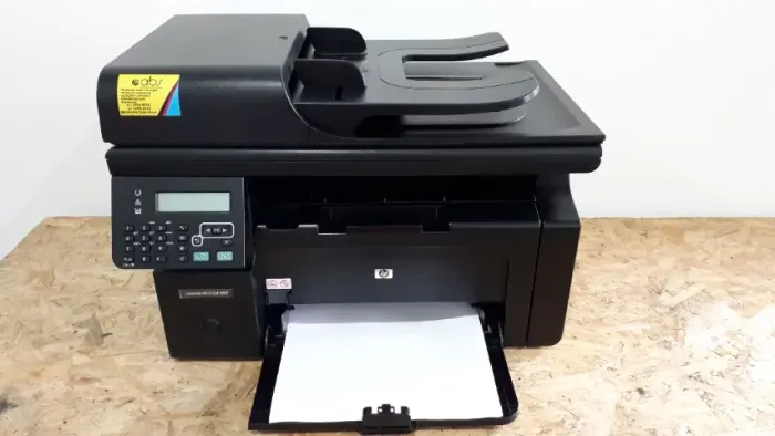 Impressora multifuncional a laser HP M1212nf completa c/um toner novo e garantia 