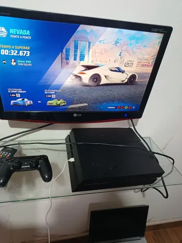 PlayStation 4 dois controles midia fisica mais de mil reais em jogos chama *