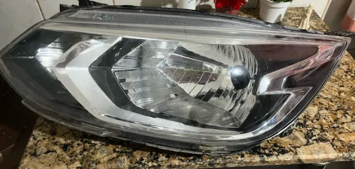 FAROL ESQUERDO CHEVROLET ÔNIX (2020/25)-LT/LTZ
