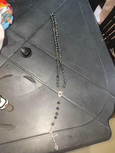Terço de pedra azul com crucifixo de prata