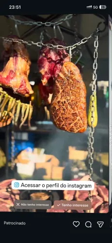 Churrasqueiro e cozinheira
