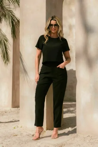 conjunto alfaiataria calça e blusa tecido viscose e poliéster, na etiqueta. Tamanho M