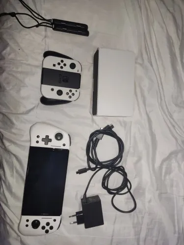 NINTENDO SWITCH OLED DESBLOQUEADO, TODOS OS ACESSÓRIOS ORIGINAIS + JOYCON DIFERENCIADO