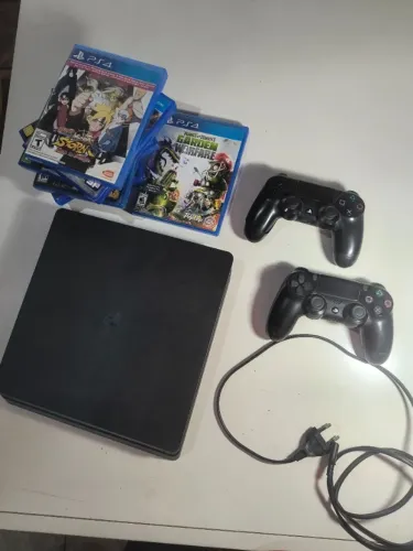 Ps4 slim 1tb+ 2 controles+ 8 jogos