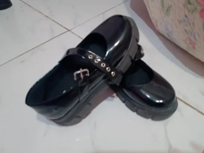 Sapatos de criança novo