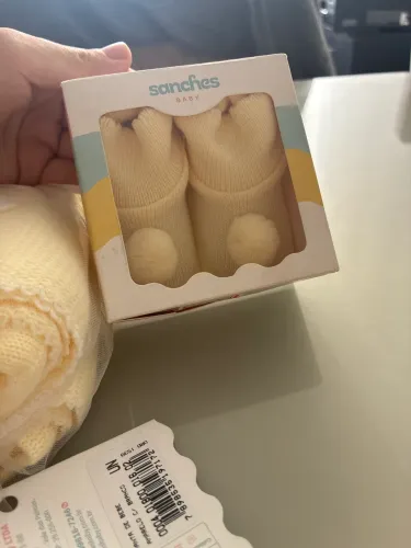 Manta e sapatinho de bebê SANCHES