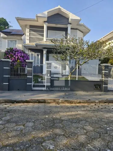 Casa de 4 dormitórios à venda Santa Mônica