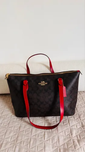 Bolsa Coach em couro