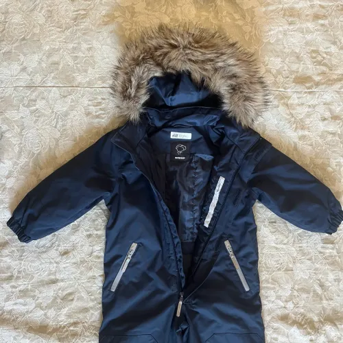 macacão infantil h&m impermeável azul marinho