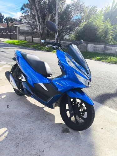 Moto impecável