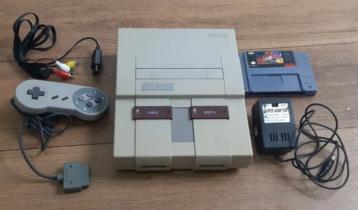 Super Nintendo Console original, controle, fonte, cabo e Aladdin repro