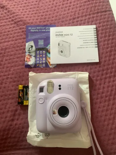 Câmera polaroid Instax Mini 12 ainda na caixa 