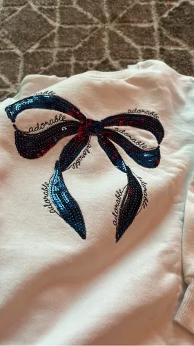 Conjunto blusa e saia short de moletom Milon menina 8 anos
