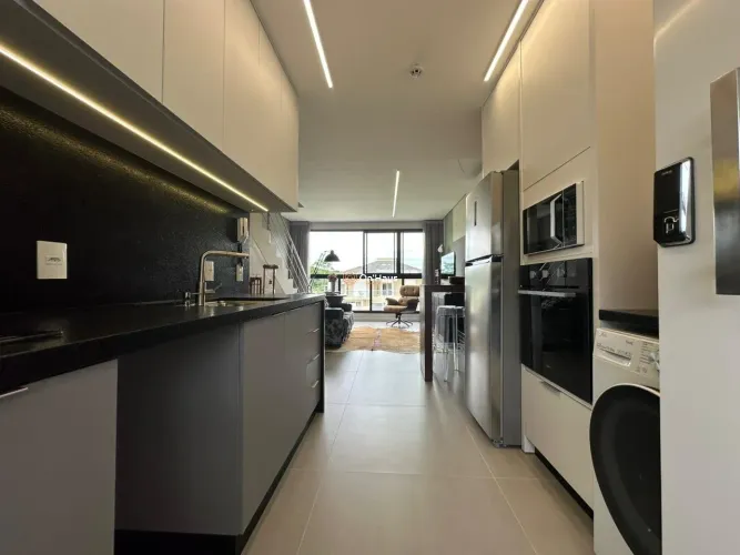 LOFT AMPLIADO COM VISTA PARA A LAGOA 100% MOBILIADO E EQUIPADO - Lagoa da Conceição - Flor