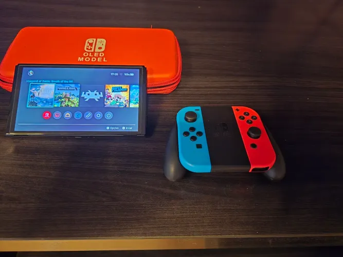 Nintendo switch Oled, completo com deck para TV e case, desbloqueado 