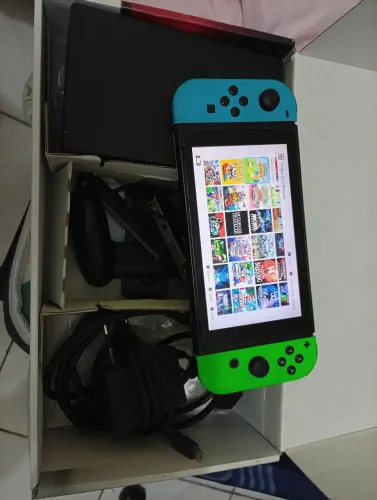Nintendo switch na caixa destravado 60 jogos 