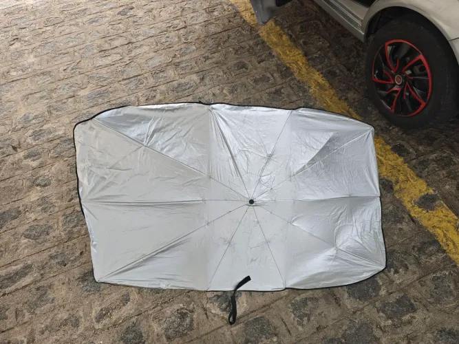 Protetor de parabrisa em formato guarda chuva