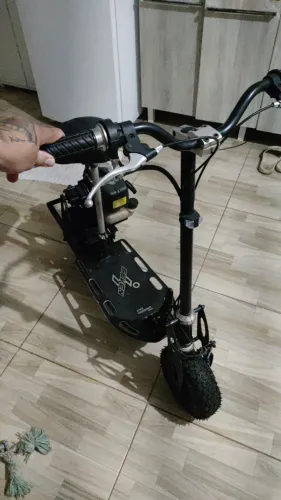 Patinete skates,motor gasolina ótimo estado pneus novos todo revisado 