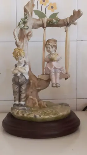 Estatueta resina