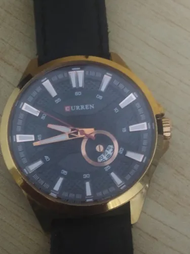 Relogio Curren masculino.