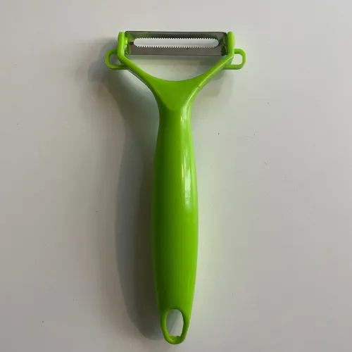 Descascador de legumes verde plástico e inox