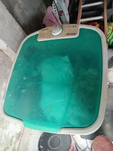 Máquina de lavar para retirar pecas