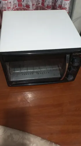 Forno elétrico, semi-novo, sem avarias.