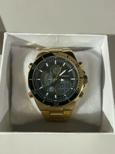 Relógio dourado newrex